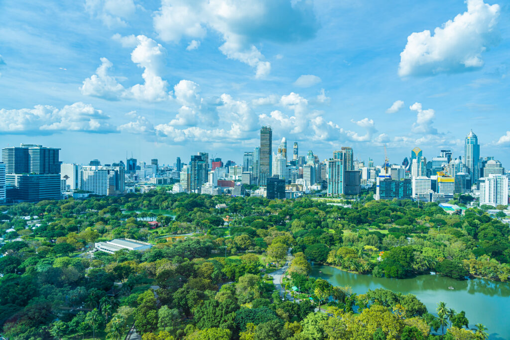 beautiful landscape cityscape with city building around lumpini park bangkok thailand