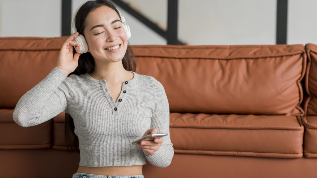 woman with headphones listening music